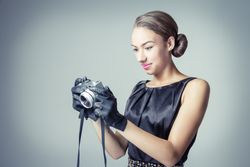 fashion model with classic vintage camera
