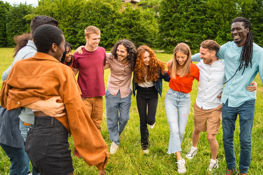 Diverse friends bonding in park