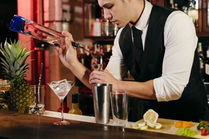 Barman working making drinks