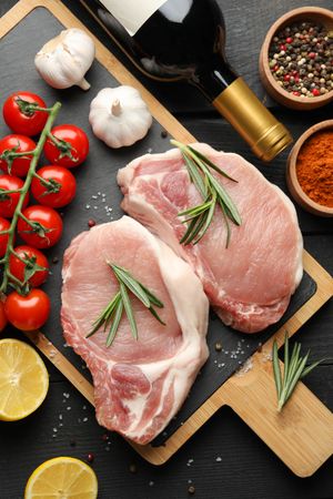 Composition with raw meat and ingredients. Cooking steak concept