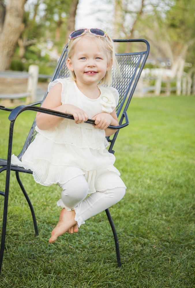 Cute Playful Baby Girl Portrait Outside at Park