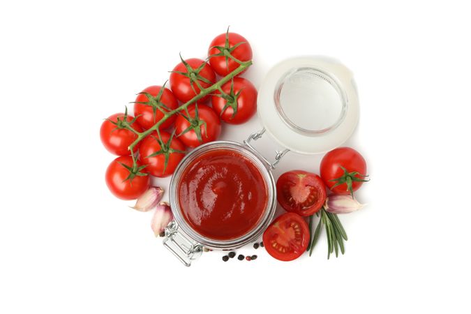 Tomatoes, sauce and ingredients isolated on neutral background