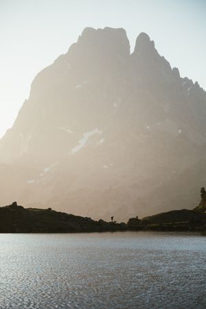 Majestic mountain landscape with human silhouette