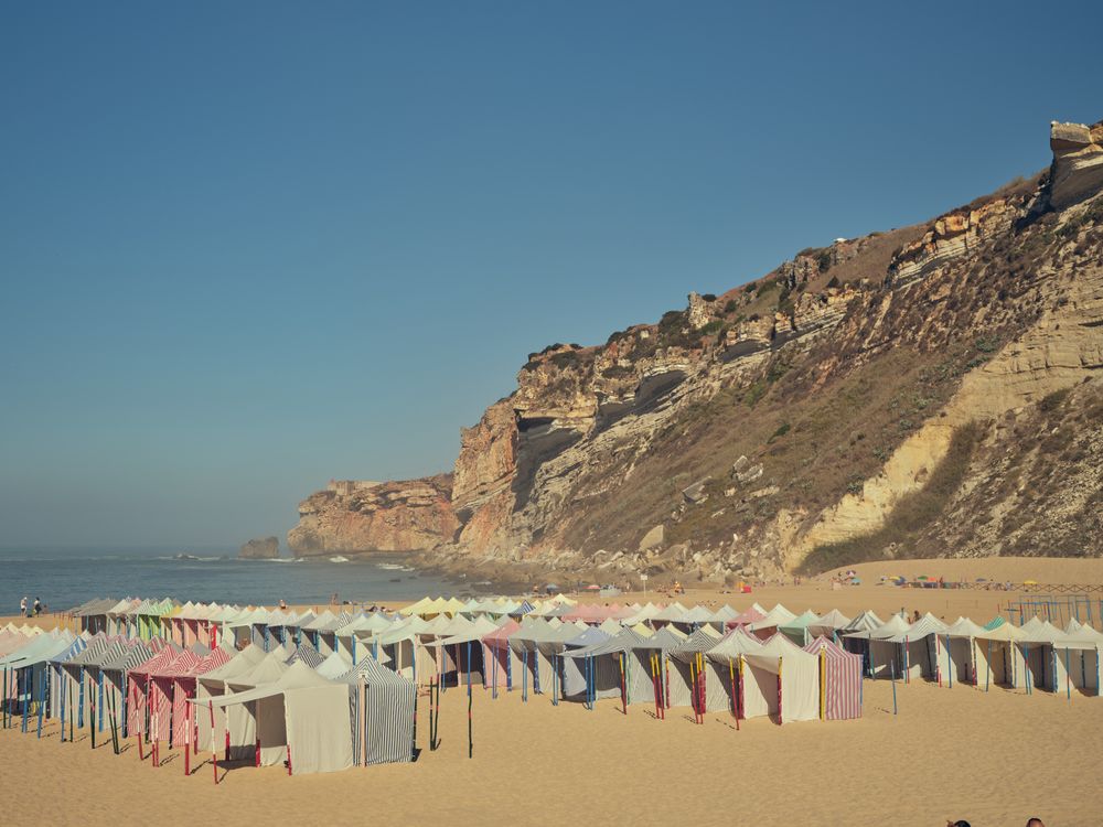 Beach with tents near sea