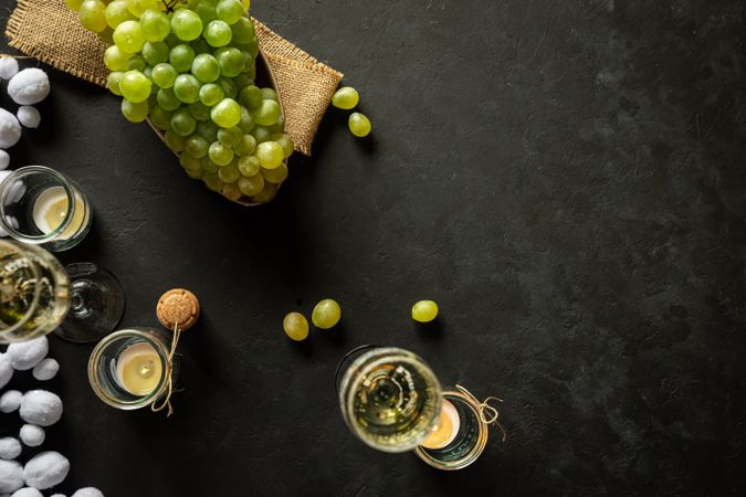 Glasses with wine and grapes
