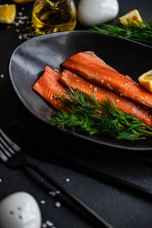 Herring fish with dill and lemon served on plate