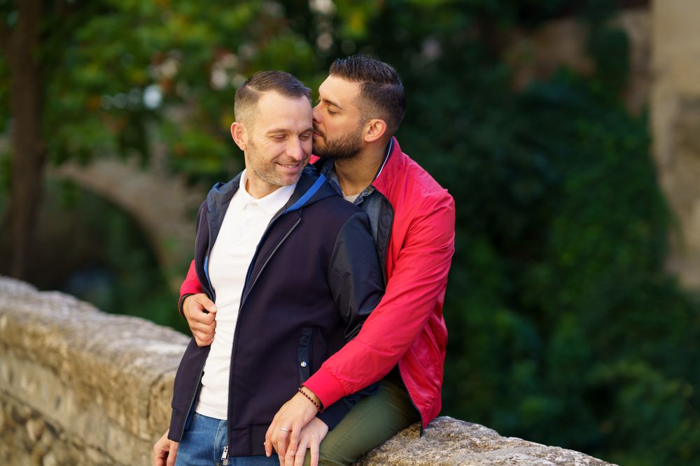 Cute couple sitting by the river