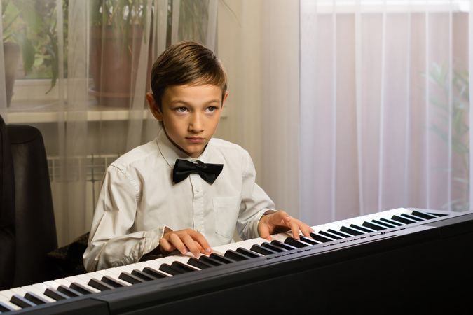 Focused Child at Piano Recital