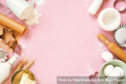 Pink background with raw ingredients for baking 5noO64