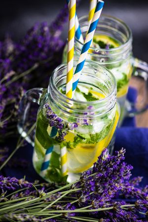 Summer detox lemonade in mason jar with lavender, lemon and mint
