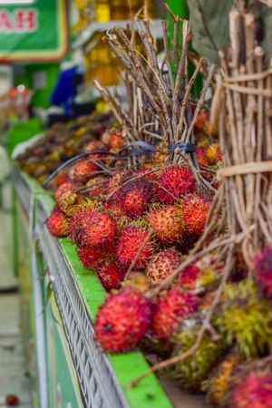 Bunch of lychee fruits for sale in grocery market