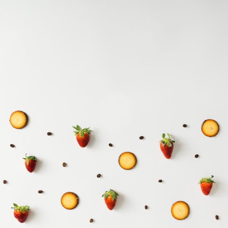 Coffee bean, cookie and strawberry pattern on light background