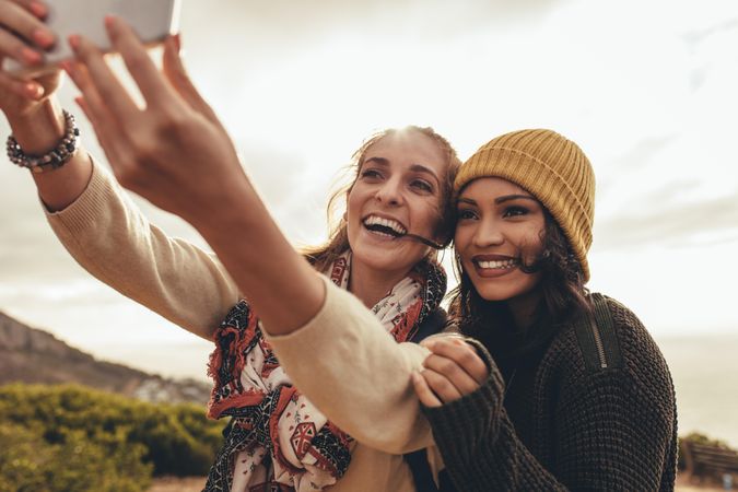 Two women taking selfie while hiking