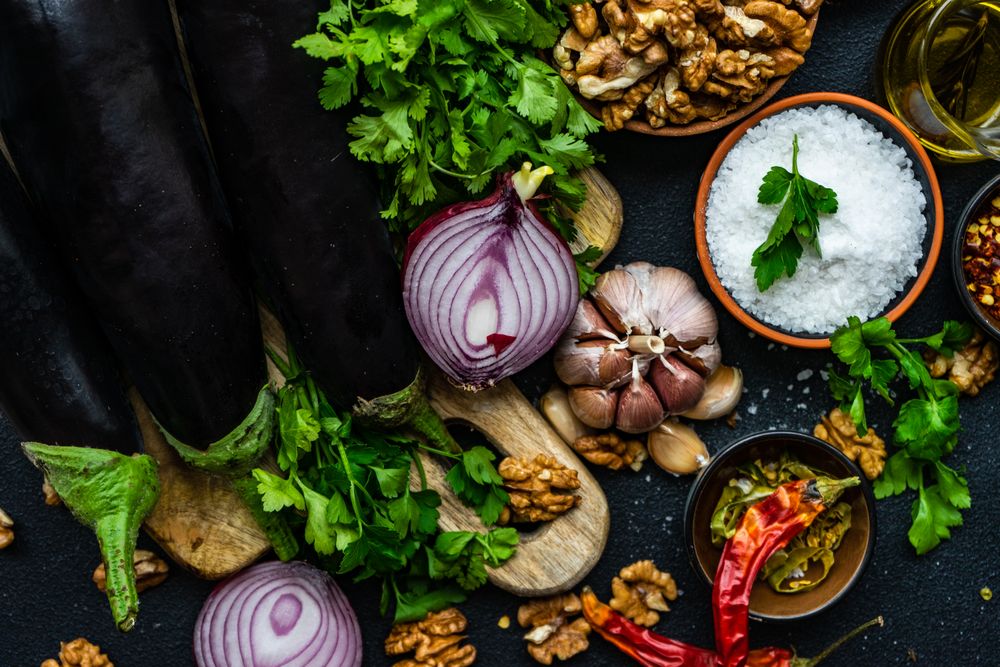 Top view of ingredients for cooking eggplant meal
