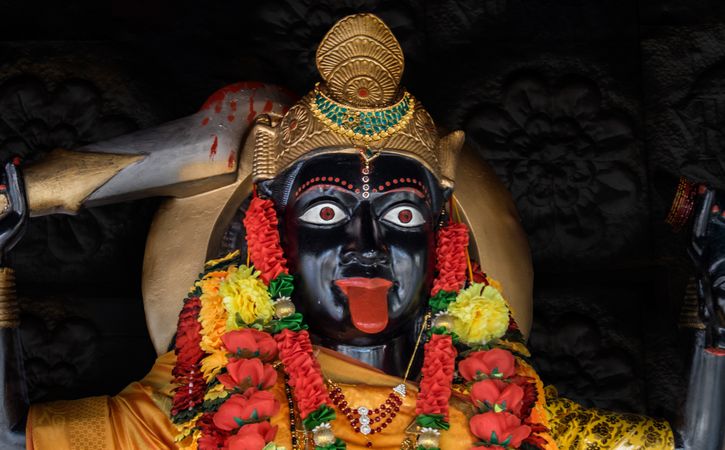 Statue of Hindu god at night