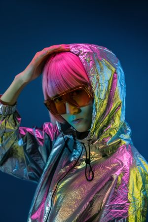 Woman standing in sparkly silver jacket