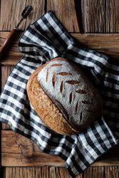 Spelt bread on checkered cloth