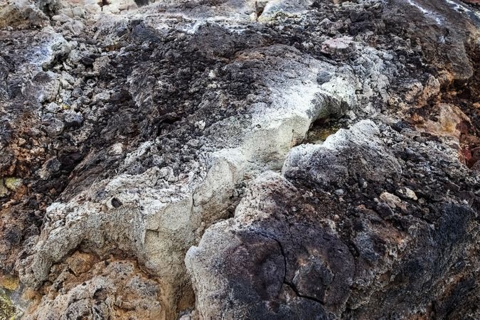 Geothermal area showing colorful rhyolite rocks and sulfur deposits in iceland