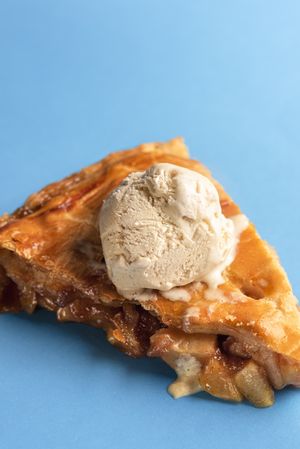 Apple pie slice with vanilla ice cream