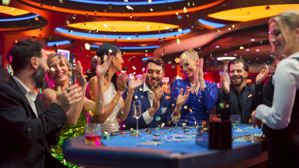People Celebrate the Lucky Winner with Cheering and Confetti.