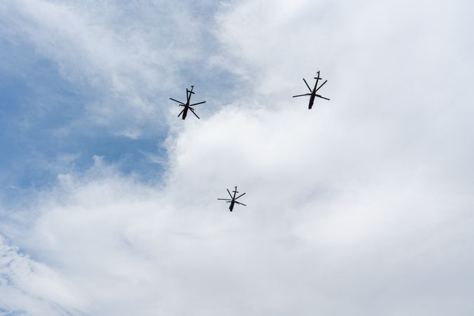 Helicopters fly in the sky of Tbilisi city