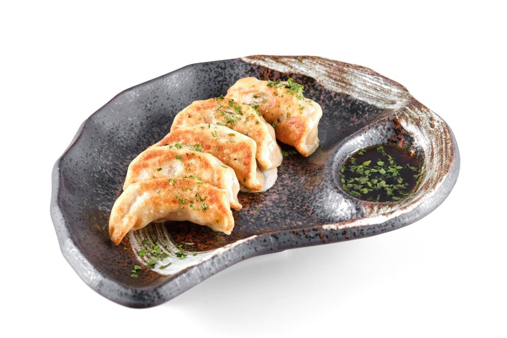 Pan seared dumplings with soy sauce