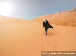 Man walking in desert 5odd94