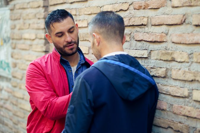 Gay couple in a romantic moment on the street