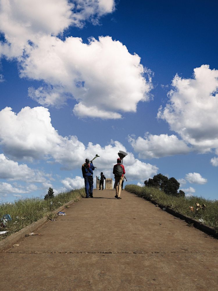 Back view of people walking on a pathway