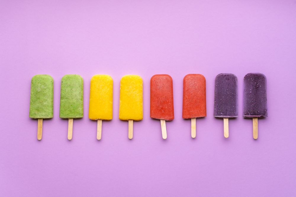 Multicolored ice cream popsicles
