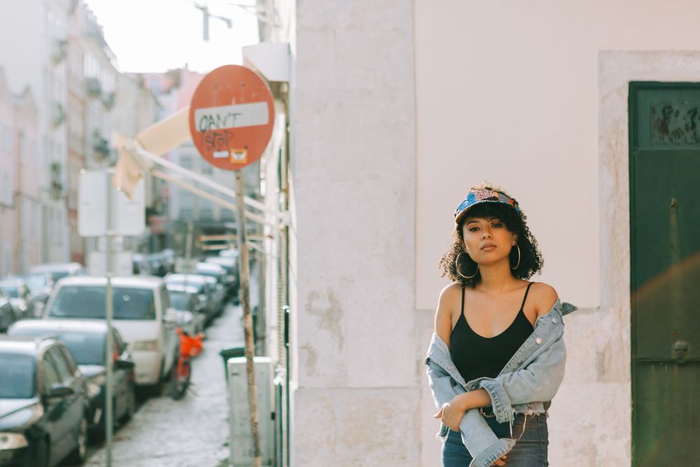 female in city street