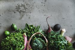 Handle of grocery bag with fresh produce, top view, horizontal composition, copy space