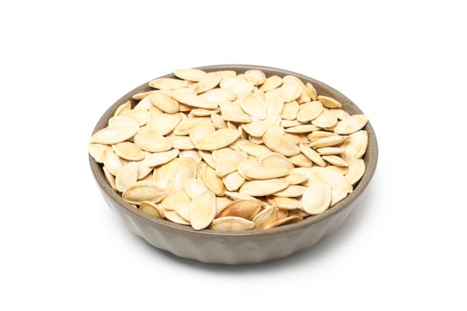 Concept of Autumn vibe food, Pumpkin, Pumpkin seeds, isolated on light background