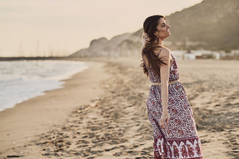 Woman with dress at the beach
