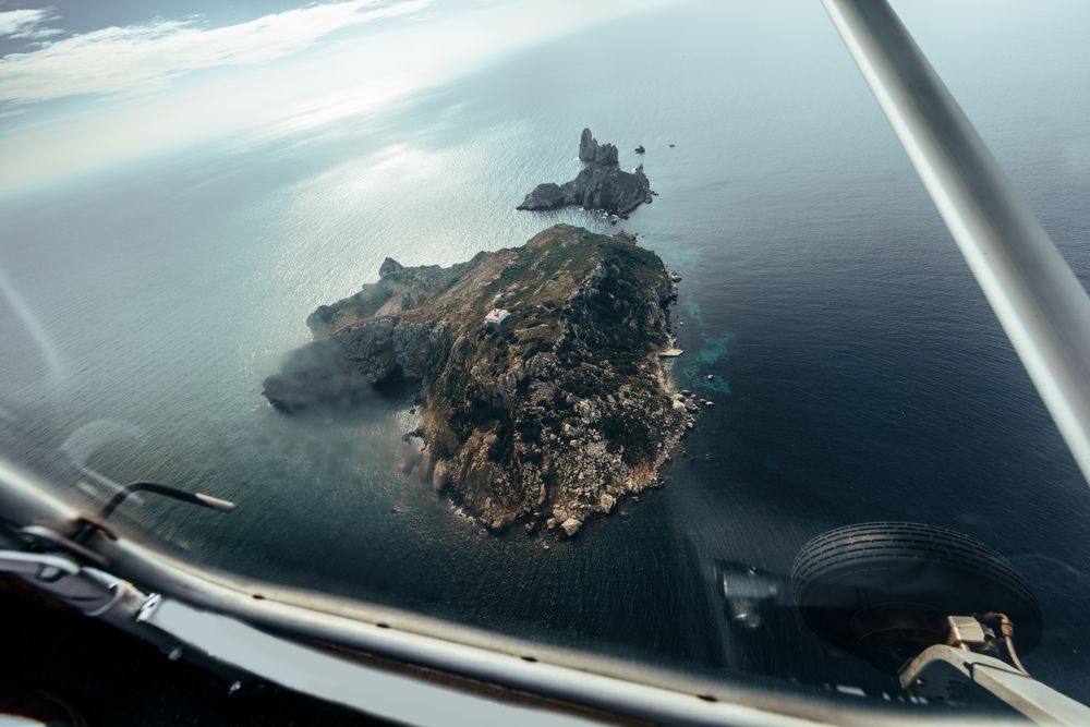 Flight over islands in the middle of the sea