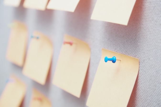 Sticky notes on a bulletin board