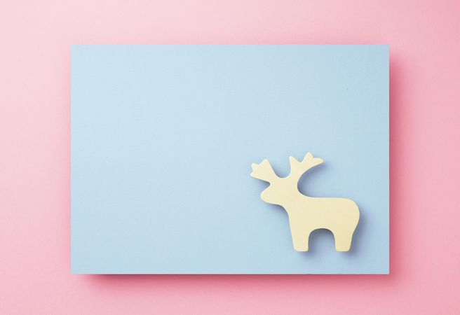 Light reindeer on blue background