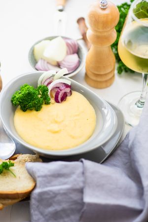 French onion cream soup served with wine served with broccoli