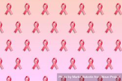 Rows on pink ribbons on pink background bGgvxb