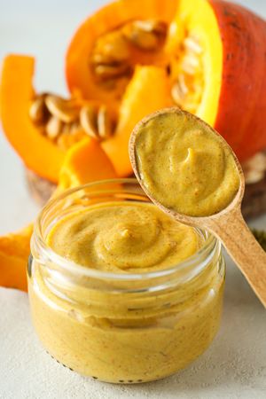Skin care and face care concept - pumpkin cosmetic