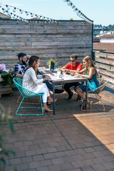 People working on the terrace of the office