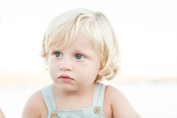 Adorable kid resting at beach