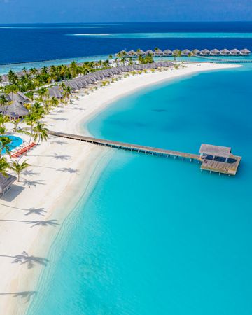 Idyllic pier on a beach resort in the Maldives