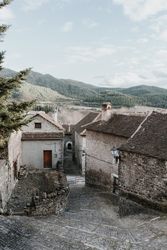 Old buildings in city near mountains