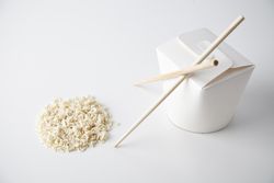 Crushed dry noodles, chopsticks and take away container