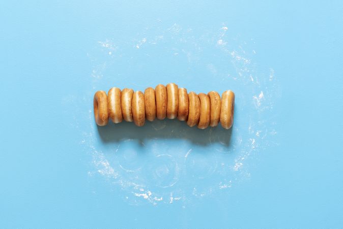 Donuts in a row on blue background