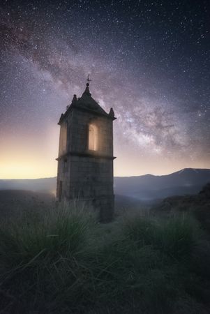 Ancient building under night starry sky