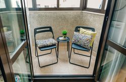 Terrace with two chairs and a small table