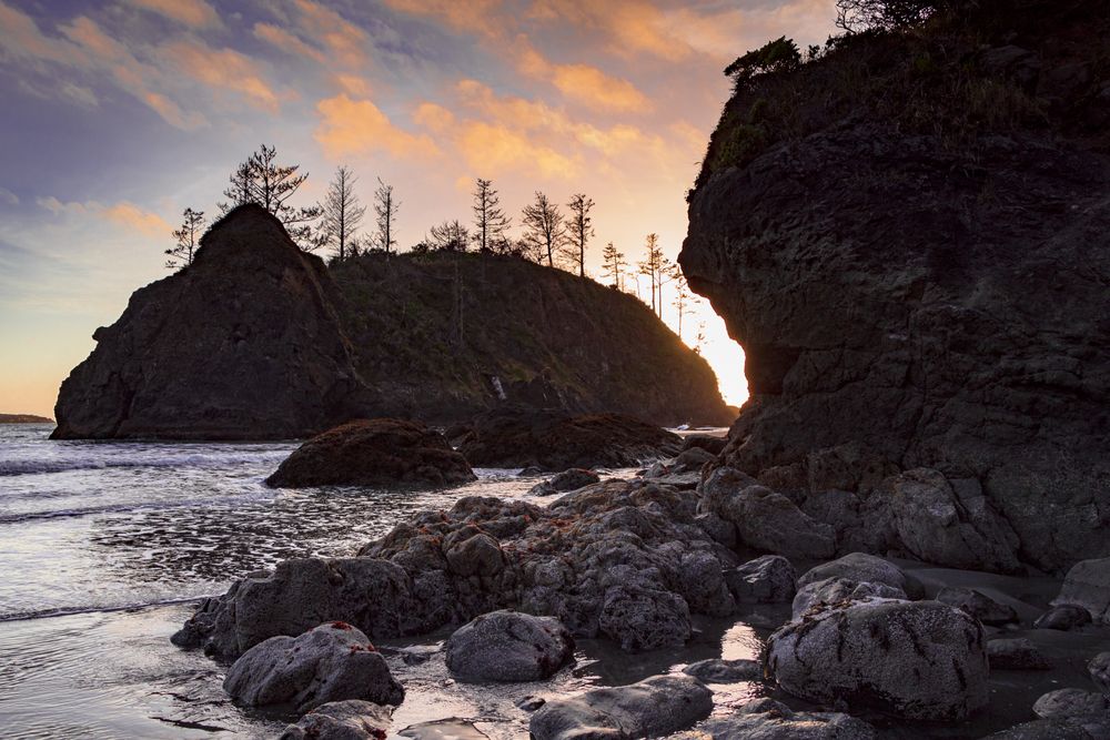 Cliffs of a beautiful rocky beach in late afternoon
