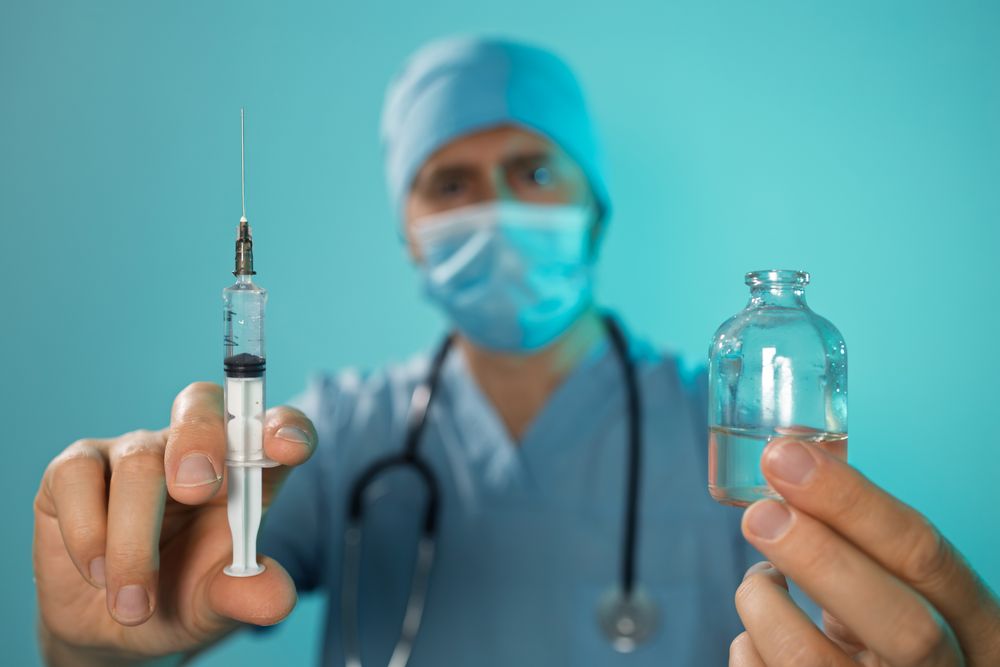 Doctor Holds New Medicine